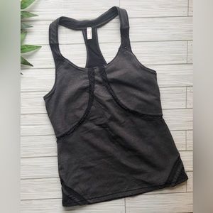 Free people movement grey athletic top with black lace detail built in bra. Sz M